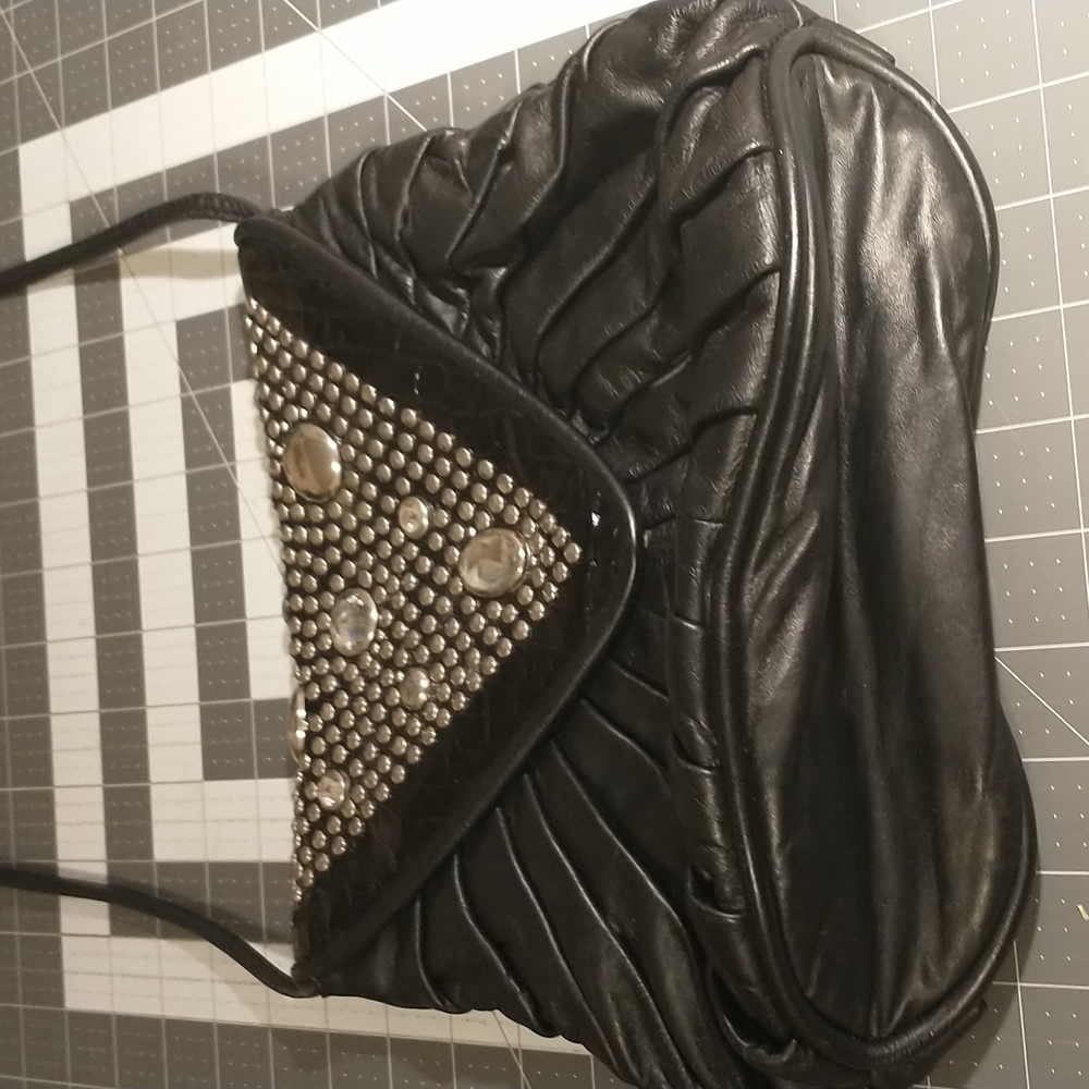 Black crossbody purse 23 in. Strap drop bejeweled Dove brand on zipper defect